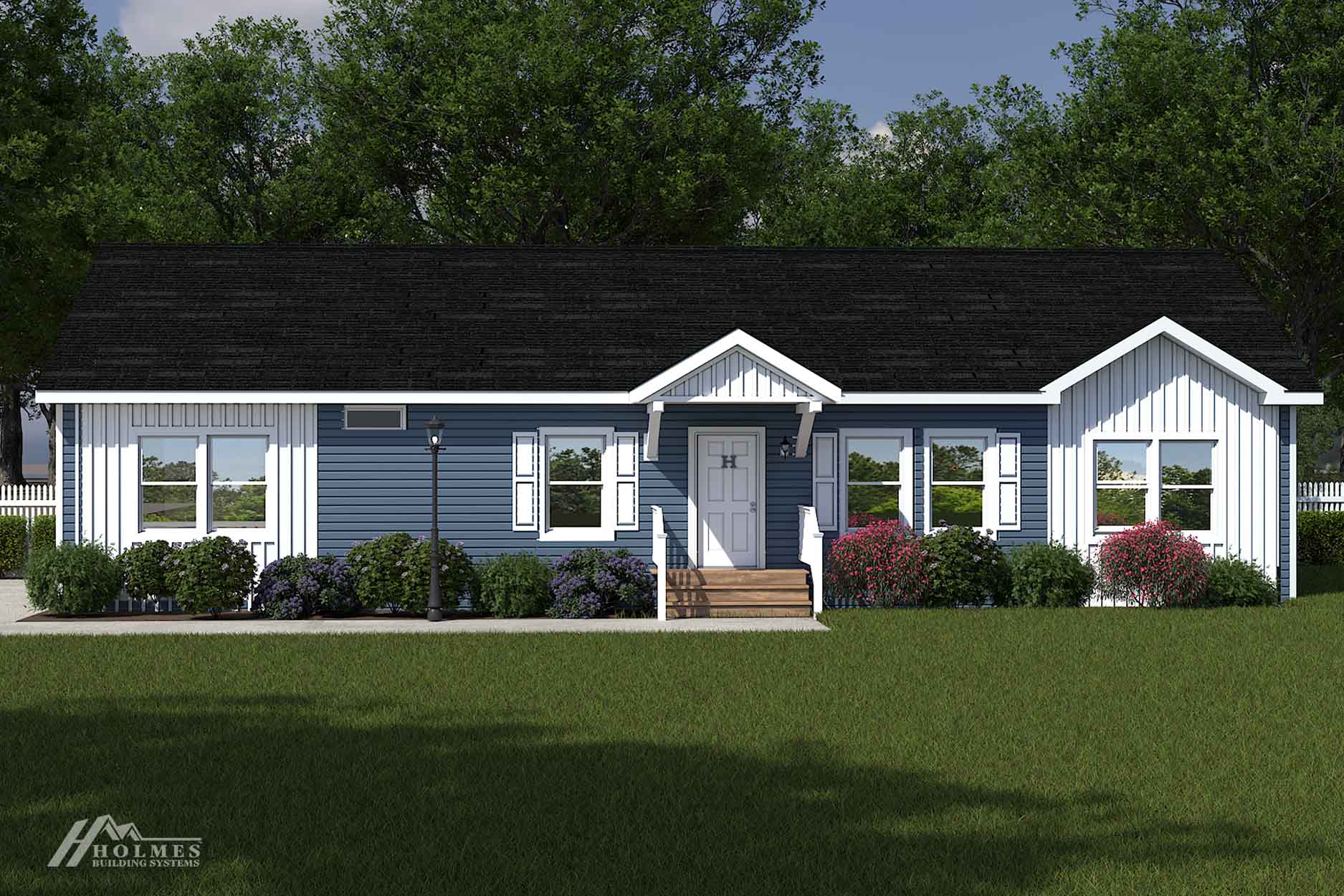 Blue single-story modular home with white trim, front porch, shrubs, and trees in the background under a blue sky.